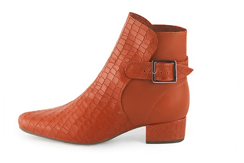 Terracotta orange women's ankle boots with buckles at the back. Round toe. Low block heels. Profile view - Florence KOOIJMAN